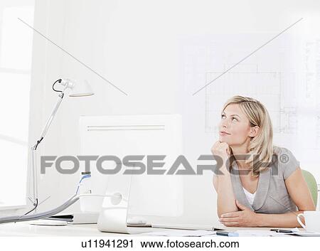 Businesswoman daydreaming View Large Photo Image Stock Image - Businesswoman daydreaming. Fotosearch