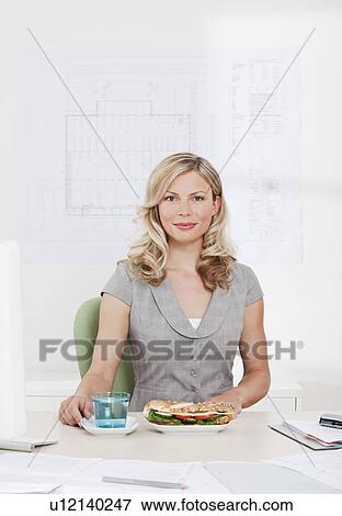 Businesswoman with healthy lunch. View Large Photo Image Stock Photo - Businesswoman with healthy lunch.. Fotosearch