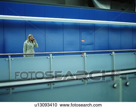 Businesswomen using mobile View Large Photo Image Stock Image - Businesswomen using mobile. Fotosearch