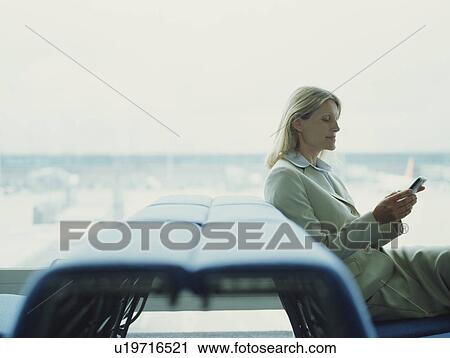 Businesswomen using mobile View Large Photo Image Stock Image - Businesswomen using mobile. Fotosearch