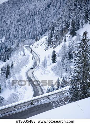 Car on snowy road View Large Photo Image Stock Photo - Car on snowy road. Fotosearch