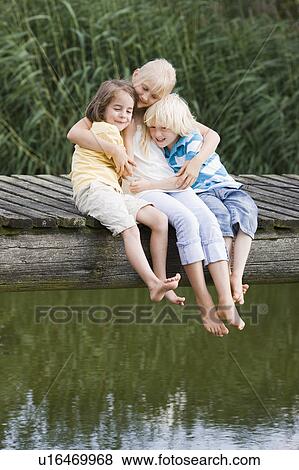 children on footbridge View Large Photo Image Stock Photo - children on footbridge. Fotosearch