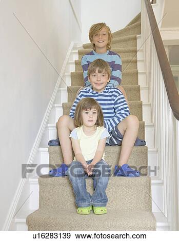 Children on stairs View Large Photo Image Stock Photo - Children on stairs. Fotosearch
