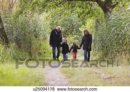 Stock Photo - Children with parents. Fotosearch