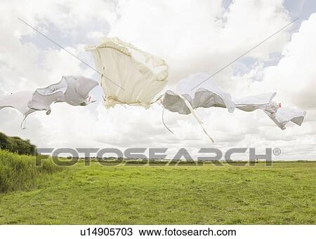Clothing on a washing line View Large Photo Image Stock Image - Clothing on a washing line. Fotosearch
