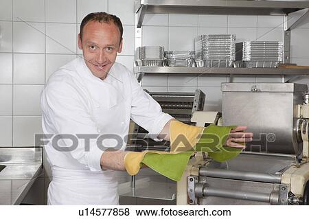 cook presenting pasta View Large Photo Image Stock Photo - cook presenting pasta. Fotosearch
