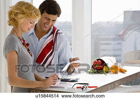 Picture - Couple at home. Fotosearch