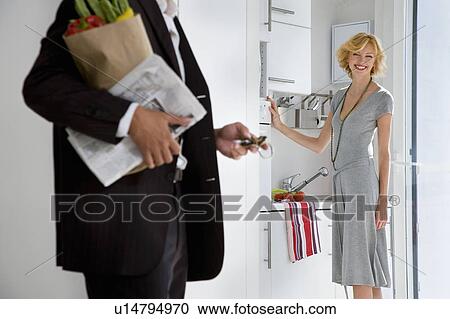 Stock Image - Couple at home. Fotosearch