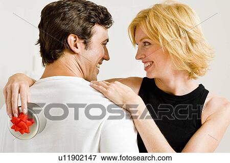 Couple at home View Large Photo Image Stock Photo - Couple at home. Fotosearch