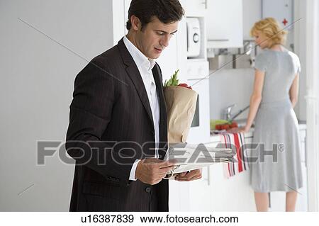 Couple at home View Large Photo Image Stock Photo - Couple at home. Fotosearch