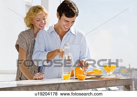 Couple at home View Large Photo Image Stock Photo - Couple at home. Fotosearch