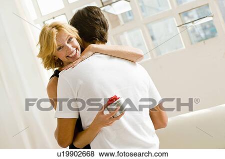 Couple at home View Large Photo Image Stock Photo - Couple at home. Fotosearch