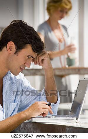 Stock Photo - Couple at home. Fotosearch