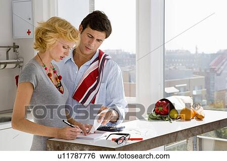 Couple at home View Large Photo Image Stock Photograph - Couple at home. Fotosearch