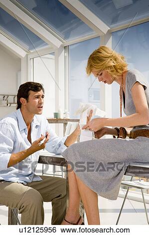 Couple at home View Large Photo Image Stock Photograph - Couple at home. Fotosearch