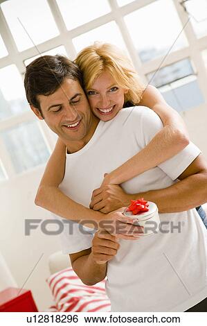 Stock Photograph - Couple at home. Fotosearch