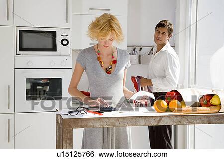 Couple at home View Large Photo Image Stock Photograph - Couple at home. Fotosearch