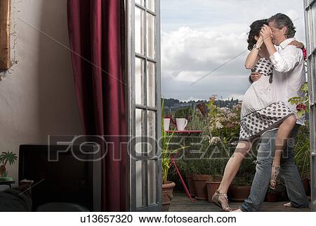 couple dancing on balcony View Large Photo Image Stock Image - couple dancing on balcony. Fotosearch