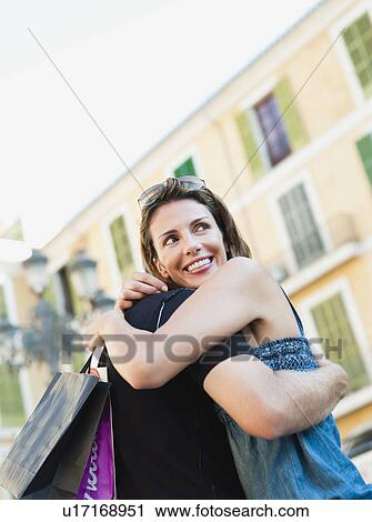 Stock Image - couple embracing each other. Fotosearch