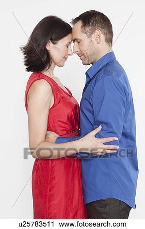 Stock Image - couple embracing each other. Fotosearch