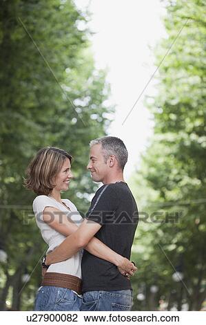 couple embracing each other View Large Photo Image Stock Image - couple embracing each other. Fotosearch