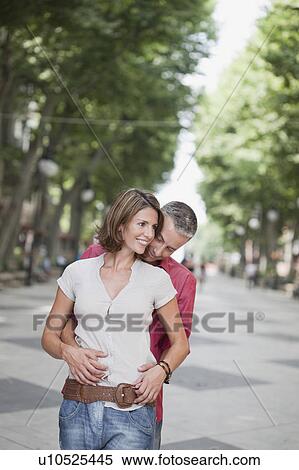 couple embracing each other View Large Photo Image Stock Photography - couple embracing each other. Fotosearch