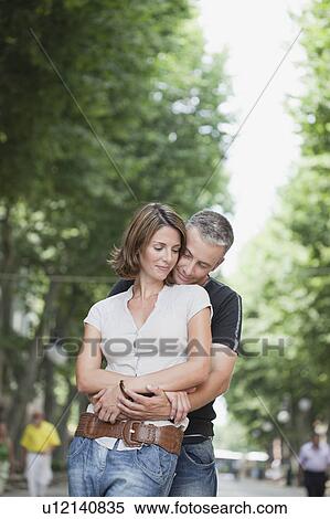 couple embracing each other View Large Photo Image Stock Photography - couple embracing each other. Fotosearch
