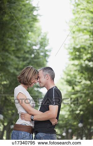 couple embracing each other View Large Photo Image Stock Photography - couple embracing each other. Fotosearch