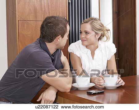 Stock Image - Couple having coffee. Fotosearch