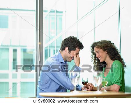 Couple having drinks View Large Photo Image Stock Image - Couple having drinks. Fotosearch