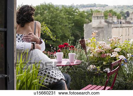 couple hugging on balcony View Large Photo Image Stock Image - couple hugging on balcony. Fotosearch