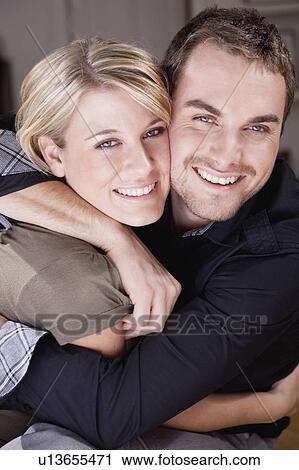 Stock Image - couple hugging. Fotosearch