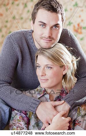 Stock Photo - couple hugging. Fotosearch