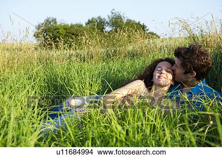 Picture - Couple in a wheat field. Fotosearch