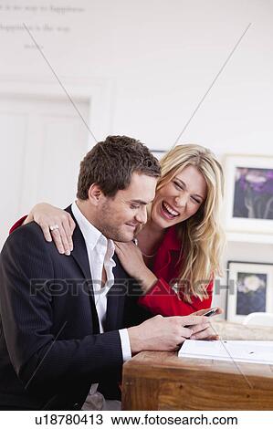 couple laughing together View Large Photo Image Stock Image - couple laughing together. Fotosearch