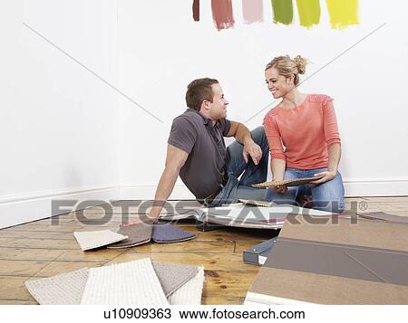Couple looking at carpet samples. View Large Photo Image Stock Image - Couple looking at carpet samples.. Fotosearch