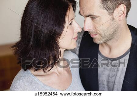 couple looking into each others eyes View Large Photo Image Picture - couple looking into each others eyes. Fotosearch
