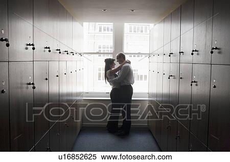 Couple office workers in locker room View Large Photo Image Stock Photography - Couple office workers in locker room. Fotosearch