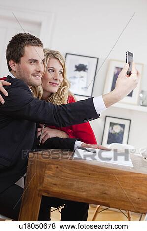 couple posing for photo View Large Photo Image Stock Photo - couple posing for photo. Fotosearch