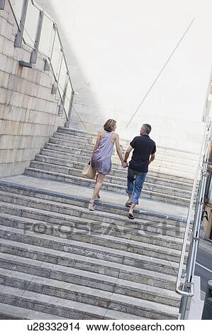 couple walking up stairs View Large Photo Image Picture - couple walking up stairs. Fotosearch