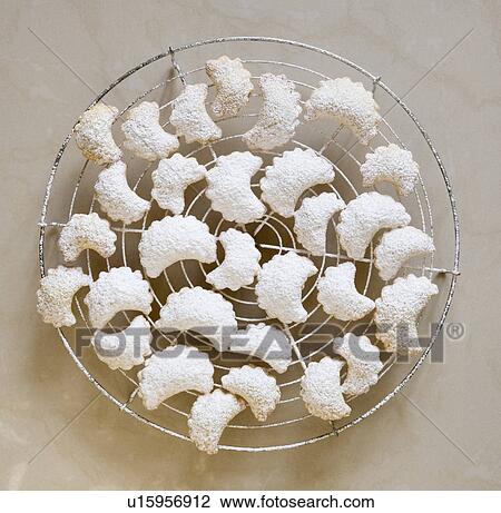 crescent shaped, white christmas cookies View Large Photo Image Stock Image - crescent shaped, white christmas cookies. Fotosearch