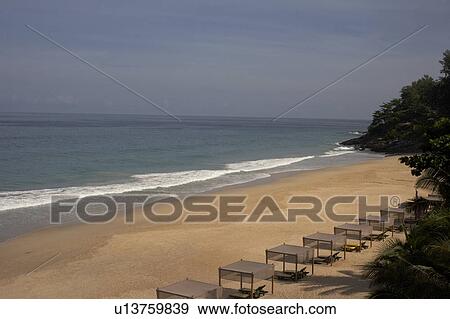 deserted beach with sunbeds View Large Photo Image Stock Photo - deserted beach with sunbeds. Fotosearch