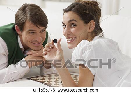 Stock Photograph - draughts for lovers. Fotosearch