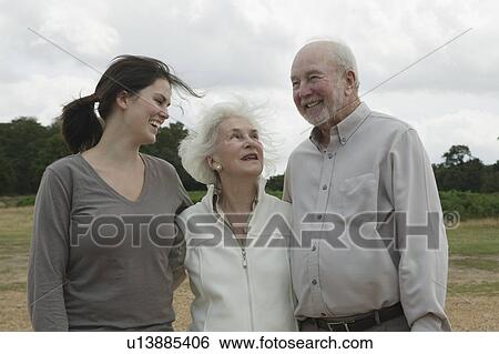 Elderly couple with granddaughter View Large Photo Image Stock Photograph - Elderly couple with granddaughter. Fotosearch