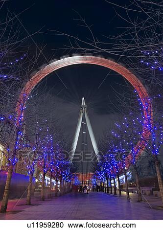 Stock Image - Fairground Wheel at night. Fotosearch