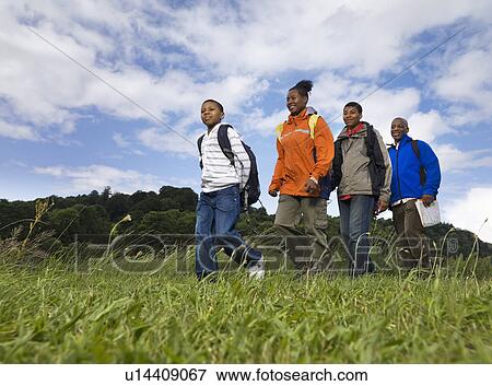family hiking View Large Photo Image Stock Photo - family hiking. Fotosearch