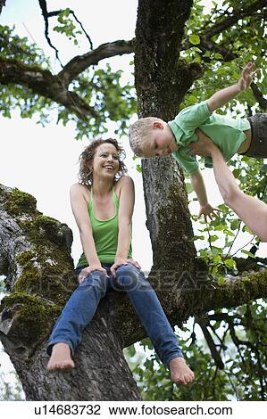 family in a garden View Large Photo Image Stock Image - family in a garden. Fotosearch