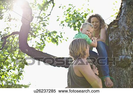 family in a garden View Large Photo Image Stock Photography - family in a garden. Fotosearch