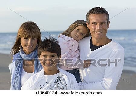 Picture - Family on the beach.. Fotosearch