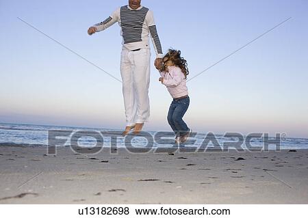 Family on the beach. View Large Photo Image Stock Photo - Family on the beach.. Fotosearch